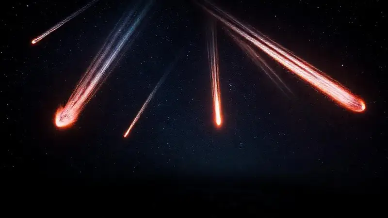 Cielo nocturno con cometas y estrellas brillantes
